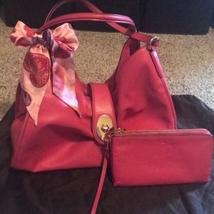 Leather Coach purse with matching wallet